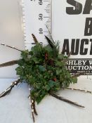 ONE CHRISTMAS WREATH TO INCLUDE FIR, SPRUCE, IVY, BERRIES, PHEASANT FEATHERS AND PUSSY WILLOW.