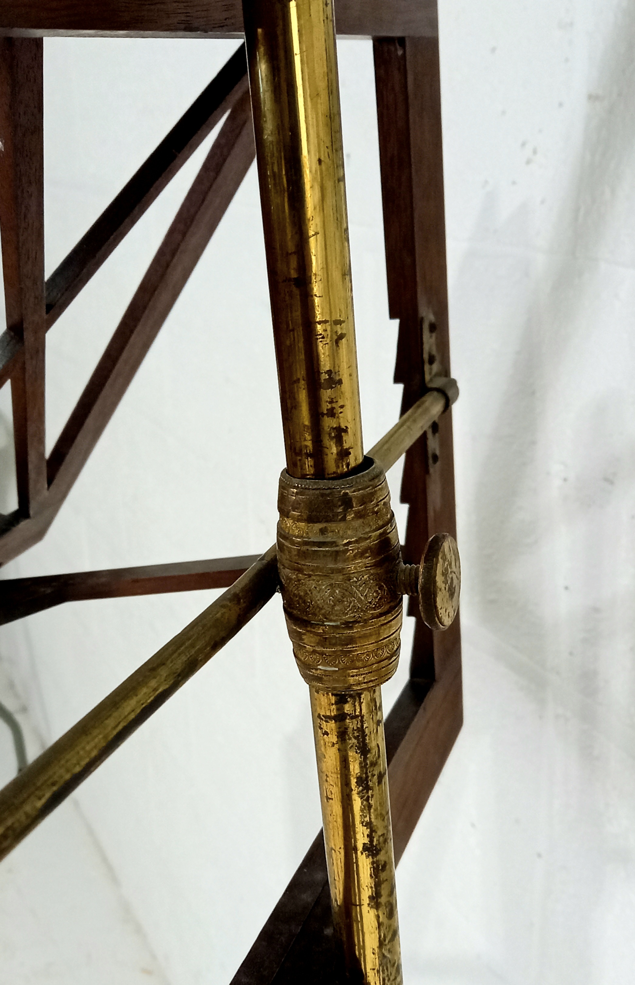 An antique mahogany and brass adjustable music stand, on turned base terminating bun feet, 138cm - Image 4 of 4