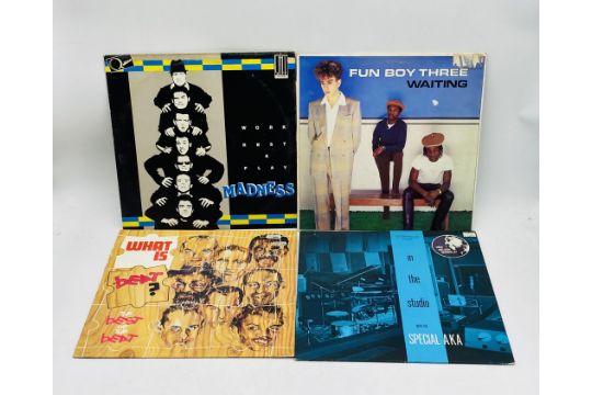 A collection of various Ska 12" & 7" vinyl records including The Specials, The Beat, Madness, The - Image 4 of 9