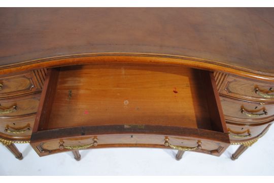 An antique Empire style kidney shaped desk, with brown leather top and seven drawers, with gilded - Image 5 of 7