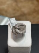 14KT WHITE GOLD BUCKLE RING .49CT DIAMONDS