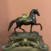 A cast and patinated gilt-bronze of a horse Possibily Portugal, 18th Century