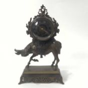 A cast and Patinated Bronze Clock with Buffalo and Orientalist Mounts France (Likely Parisian manufa
