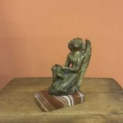 A Cast gilt- Bronze figure of a Kneeling Angel Holding a Phylactery Italy, 15th Century