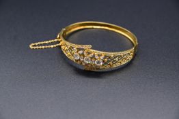 18 K GG Armreif mit Diamanten