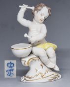 Figurenguppe "Musizierende Putto mit Pauke" auf Rocaillesockel aus dem Frankenthaler Puttenorchest