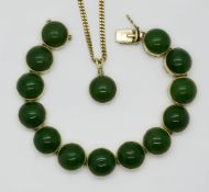 1 Kette/1 Anhänger mit passendem Armband je GG 14ct.