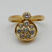 1 Damenring GG 18ct. mit Brill. lt. Schiene zus. 0,8ct. wohl gute Qualität, wirkt hell,