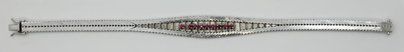1 Damenarmband WG 14ct. mit 9 Rubinen