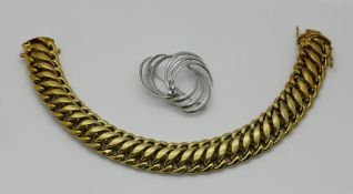 1 Damenarmband GG 14ct., 1 Brosche WG 14ct. mit Solitärbrillanten lt. Rechnungs-/Juwelenpasskopie: