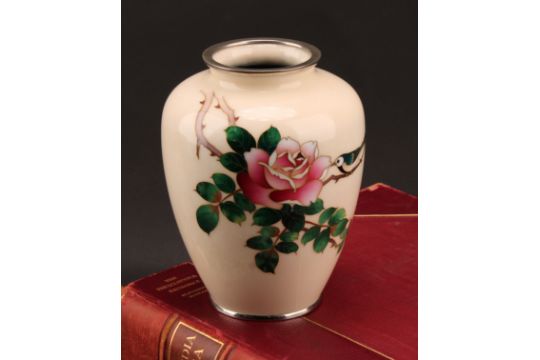 A Japanese cloisonne enamel ovoid vase, decorated with a bird perched on a rose branch, on a pale - Image 1 of 5