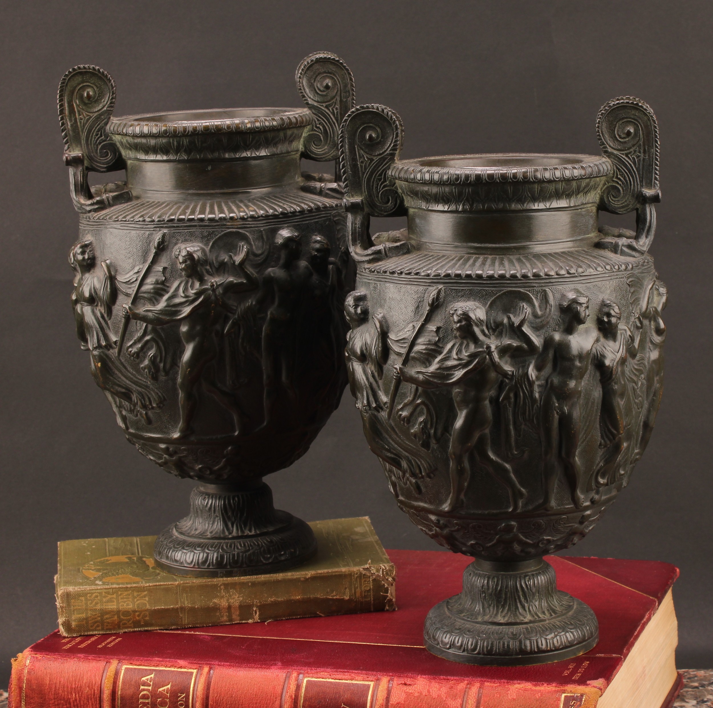 A pair of neoclassical patinated bronze kraters or vases, after the Charles Townley vase, cast in