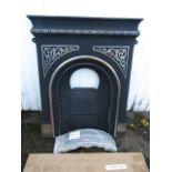 A cast iron fireplace made by Gallery, with art nouveau design 82cmH 100cmH with grate and shelf, as