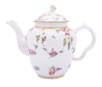 A Champion's Bristol teapot and cover of ogee form with bud finial and ribbed ear-shaped handle,