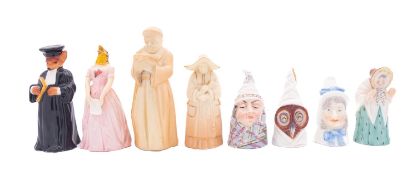 Eight Royal Worcester candle extinguishers,