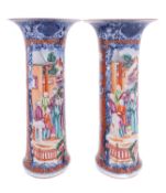 A pair of Chinese porcelain sleeve vases of flaring cylindrical form painted in underglaze blue and