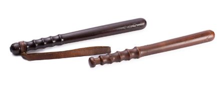 Two similar turned hardwood policeman's tripstaffs,