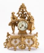 A mid-Victorian gilt-metal and alabaster mantel clock the eight-day duration movement striking the