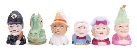 Six Royal Worcester limited edition porcelain candle extinguishers, comprising Punch, Judy, Baby,