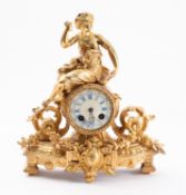A mid-Victorian gilt-metal clock the eight-day duration movement striking the hours and half-hours