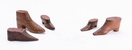 A group of five treen 'shoe' snuff boxes two inlaid with pique work,