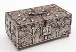 An Arts & Crafts steel casket in 16th century taste, late 19th century; the hinged cover, front,