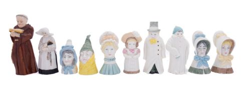 Ten Royal Worcester reissued candle extinguishers, comprising Monk, Nun, Young Woman, Old Woman,
