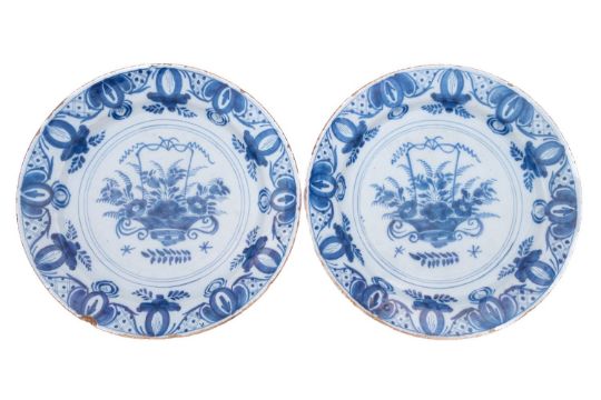 A pair of Dutch Delft pottery chargers,