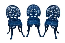 A set of three blue painted metal garden chairs,