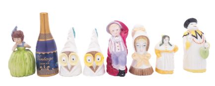 Eight Royal Worcester reissued candle extinguishers, comprising French Cook, Mandarin,