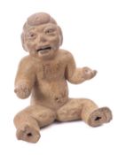 A Pre-Columbian pottery figure, in Olmec style,