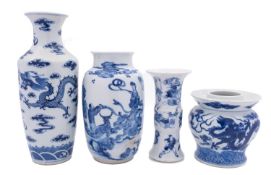 A Chinese blue & white spittoon and three vases,
