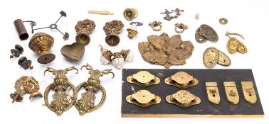 A quantity of brass mounts and fittings,