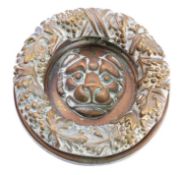 A heavy brass door knocker in Regency style,