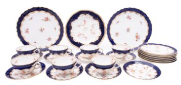 A Coalport porcelain part tea service, comprising seven cups, eight saucers,