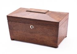 A Regency rosewood tea caddy, circa 1815; of sarcophagus form,