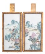 A pair of Chinese famille verte/rose porcelain plaques enamelled with pavilions in extensive