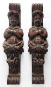 A pair of carved and stained walnut terms, in Renaissance style,