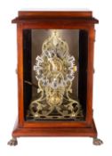 Evans of Handsworth, an English skeleton clock of scroll design,