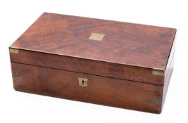 A Regency or George IV walnut and brass mounted writing slope, by Woodfield & Co.