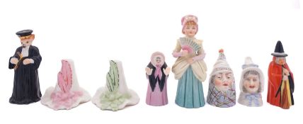 Six Royal Worcester candle extinguishers, comprising Mr and Mrs Caudle, Monsieur Reynard, Town Girl,