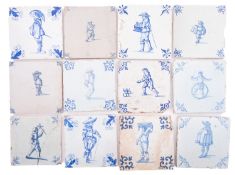 A group of twenty-three Dutch and English blue and white delftware tiles painted with single