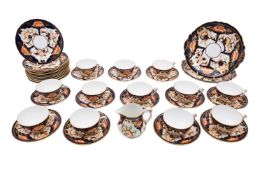 A Royal Crown Derby porcelain part tea service, early 20th century decorated in Imari pattern no.