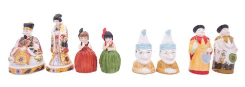 Eight Royal Worcester porcelain candle extinguishers,