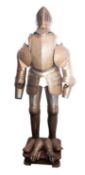 A Victorian engraved iron suit of armour, in Mediaeval style,