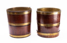 Two similar brass bound mahogany buckets,