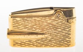 A vintage Ronson lighter, gold plated wi