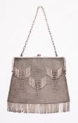 A silver mesh link purse, the clasp stam