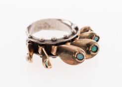 A unique opal ring, a hammered finish wh