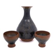 A Chinese 'Hares Fur' vase and two small cups, vase 19cm high.
